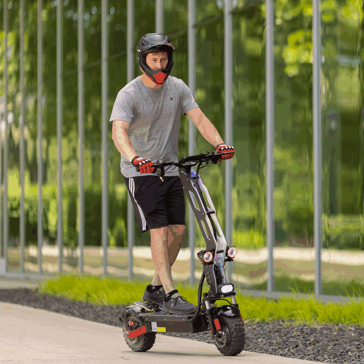 Freego D11 riding near the building with green shadow