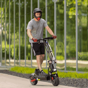Freego D11 riding near the building with green shadow
