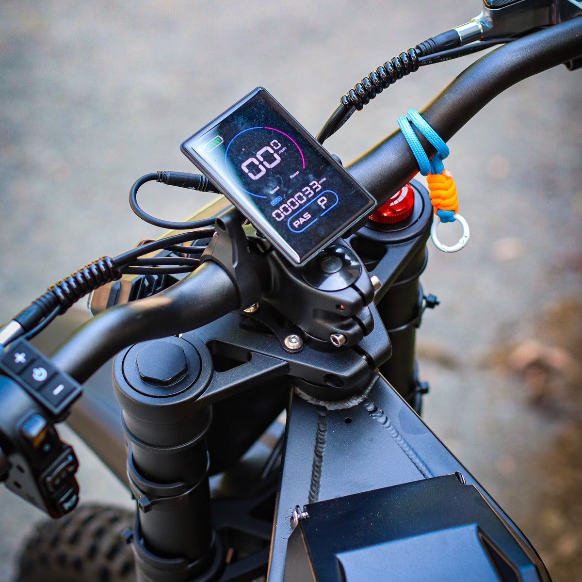 Close-up shot of the digital dashboard display on the Freego Nova 4 electric bike, showing speed and settings